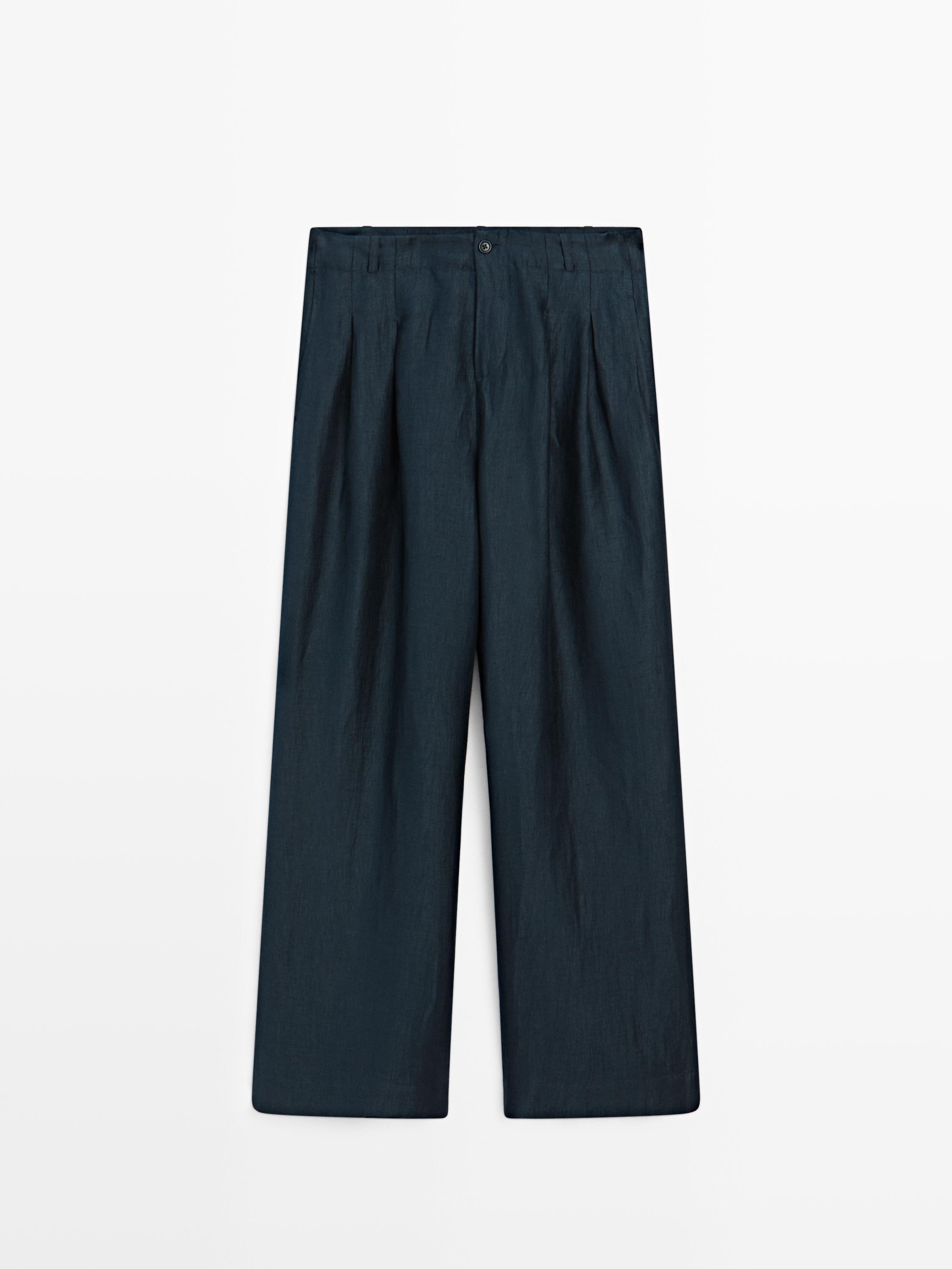 Loose-fitting linen blend trousers